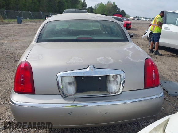 2001 Lincoln Town Car Signature with VIN 1LNHM82W21Y684197, listed as a IAAI auction lot 41944429 with 159,297 mi miles and . Bid and sale history available at DreamBid. Image 16.