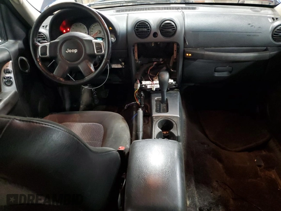 2004 Jeep Liberty Limited z VIN 1J4GL58KX4W101374, wystawiony jako Copart lot #51080895 z przebiegiem 288 747 mil mil oraz Szkoda całkowita • Salvage title. Historia ofert i sprzedaży dostępna na DreamBid. Obrazek 8.