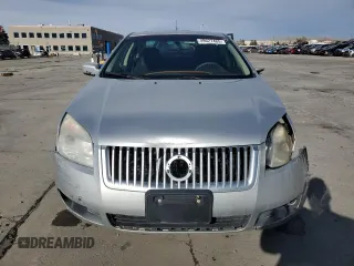 2009 Mercury Milan with VIN 3MEHM07Z29R634238, listed as a Copart auction lot 49627485 with 102,404 mi miles and Salvage title. Bid and sale history available at DreamBid. Image 5.