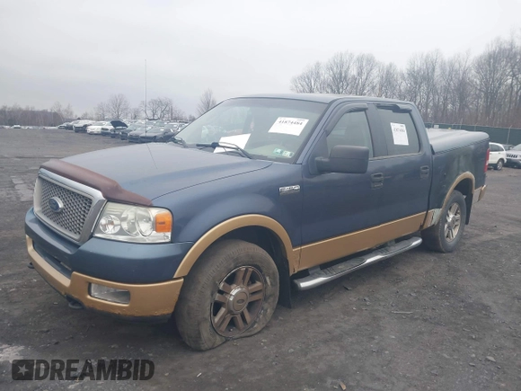 2005 Ford F-150 XLT with VIN 1FTPW14565KE80310, listed as a IAAI auction lot 41874484 with 173,315 mi miles. Bid and sale history available at carsss.com. Image 2.