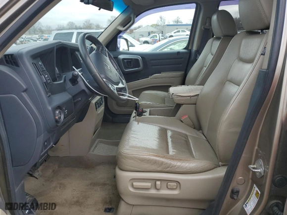 2011 Honda Ridgeline RTL with VIN 5FPYK1F51BB004639, listed as a Copart auction lot 49826765 with 284,356 mi miles and Clean Title. Bid and sale history available at carsss.com. Image 7.