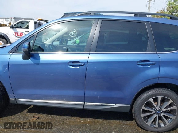 2017 Subaru Forester Touring with VIN JF2SJGWC5HH567870, listed as a IAAI auction lot 42007542 with 76,560 mi miles. Bid and sale history available at carsss.com. Image 14.