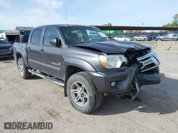 2014 Toyota Tacoma PreRunner with VIN 3TMJU4GN1EM156845, listed as a IAAI auction lot 40972570 with 65,138 mi miles. Bid and sale history available at carsss.com. Image 1.