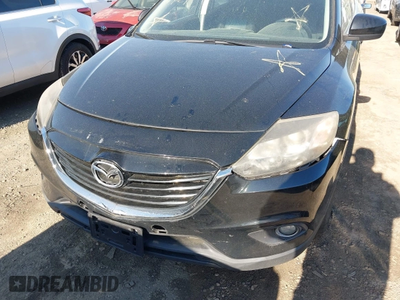 2014 Mazda CX-9 Touring with VIN JM3TB3CV4E0444786, listed as a IAAI auction lot 42249827 with Not provided miles and . Bid and sale history available at DreamBid. Image 6.