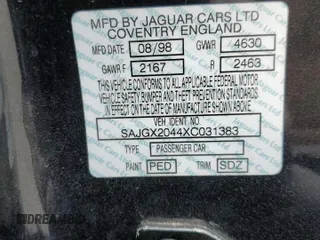 1999 Jaguar XK z VIN SAJGX2044XC031383, wystawiony jako Copart lot #54726925 z przebiegiem 107 696 mil mil oraz Szkody całkowita. Historia ofert i sprzedaży dostępna na DreamBid. Obrazek 12.