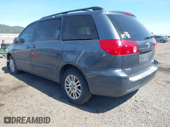 2009 Toyota Sienna XLE with VIN 5TDBK22C69S027767, listed as a IAAI auction lot 42029832 with 200,752 mi miles and . Bid and sale history available at DreamBid. Image 3.