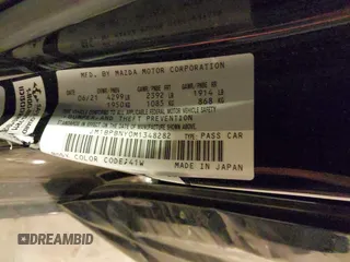 2021 Mazda 3 Premium Plus с VIN JM1BPBNY0M1348282, выставлен на аукционе IAAI как лот 42141569 с пробегом 29 848 миль миль и . История ставок и продаж доступна на DreamBid. Изображение 9.