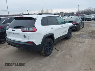 2022 Jeep Cherokee X with VIN 1C4PJMCX0ND537673, listed as a IAAI auction lot 41696191 with 22,063 mi miles. Bid and sale history available at carsss.com. Image 4.