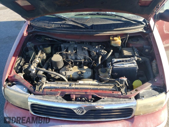 1996 Mercury Villager GS z VIN 4M2DV11W3TDJ03500, wystawiony jako Copart lot #70410394 z przebiegiem 252 139 mil mil oraz Szkoda całkowita • Salvage title. Historia ofert i sprzedaży dostępna na DreamBid. Obrazek 13.