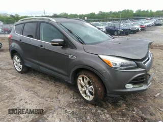 2013 Ford Escape Titanium with VIN 1FMCU0J92DUC70534, listed as a IAAI auction lot 41967096 with 77,921 mi miles and . Bid and sale history available at carsss.com. Image 1.
