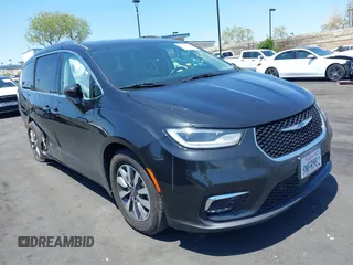 2021 Chrysler Pacifica Hybrid Touring L с VIN 2C4RC1L71MR599631, выставлен на аукционе IAAI как лот 42151965 с пробегом 67 401 миль миль и . История ставок и продаж доступна на DreamBid. Изображение 1.