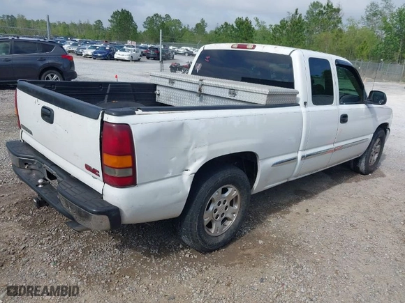 2002 GMC Sierra 1500 SLE with VIN 2GTEC19V421138682, listed as a IAAI auction lot 41945481 with 520,499 mi miles. Bid and sale history available at carsss.com. Image 4.
