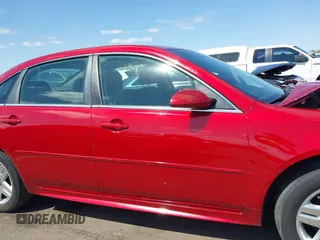 2014 Chevrolet Impala LT with VIN 2G1WB5E38E1132304, listed as a IAAI auction lot 42072869 with 128,579 mi miles and . Bid and sale history available at DreamBid. Image 13.