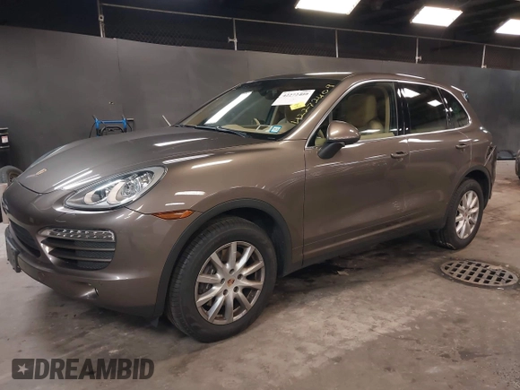 2014 Porsche Cayenne with VIN WP1AA2A26ELA93026, listed as a IAAI auction lot 42272409 with 58,951 mi miles and . Bid and sale history available at DreamBid. Image 2.