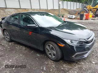 2020 Honda Civic LX with VIN 19XFC2F66LE216892, listed as a IAAI auction lot 42505133 with 29,718 mi miles and . Bid and sale history available at DreamBid. Image 1.