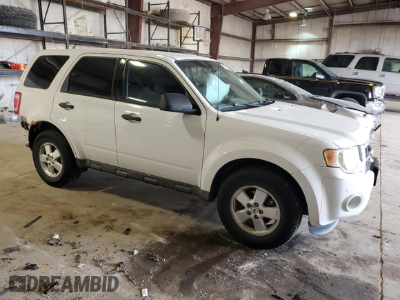 2011 Ford Escape XLS с VIN 1FMCU0C78BKC53371, выставлен на аукционе Copart как лот 54767005 с пробегом 227 192 миль миль и Списание • Salvage title. История ставок и продаж доступна на DreamBid. Изображение 4.