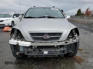 2003 Kia Sorento LX z VIN KNDJC733335030322, wystawiony jako Copart lot #77607974 z przebiegiem 109 777 mil mil oraz Szkoda całkowita • Salvage title. Historia ofert i sprzedaży dostępna na DreamBid. Obrazek 5.