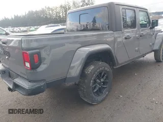 2021 Jeep Gladiator Willys with VIN 1C6HJTAG5ML616706, listed as a IAAI auction lot 41367142 with 50,951 mi miles and . Bid and sale history available at carsss.com. Image 4.