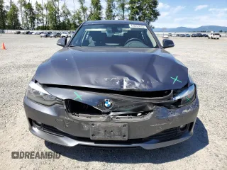 2014 BMW 3 Series 320i with VIN WBA3B1C54EK132952, listed as a Copart auction lot 63653435 with 63,260 mi miles and Salvage title. Bid and sale history available at DreamBid. Image 5.