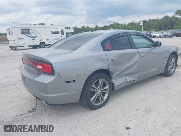 2014 Dodge Charger RT Plus with VIN 2C3CDXDT7EH159703, listed as a IAAI auction lot 41763606 with 132,333 mi miles. Bid and sale history available at carsss.com. Image 4.