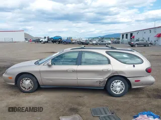 1998 Ford Taurus with VIN 1FAFP57U8WG275844, listed as a IAAI auction lot 42426107 with 318,654 mi miles and . Bid and sale history available at DreamBid. Image 14.