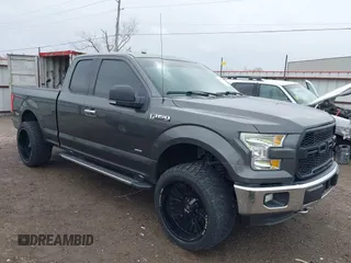 2015 Ford F-150 XLT with VIN 1FTEX1EP9FFC75210, listed as a IAAI auction lot 39041797 with 125,522 mi miles. Bid and sale history available at carsss.com. Image 1.