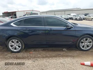 2014 Chevrolet Impala LT with VIN 2G1115SLXE9222573, listed as a IAAI auction lot 42119082 with 147,011 mi miles and . Bid and sale history available at DreamBid. Image 13.