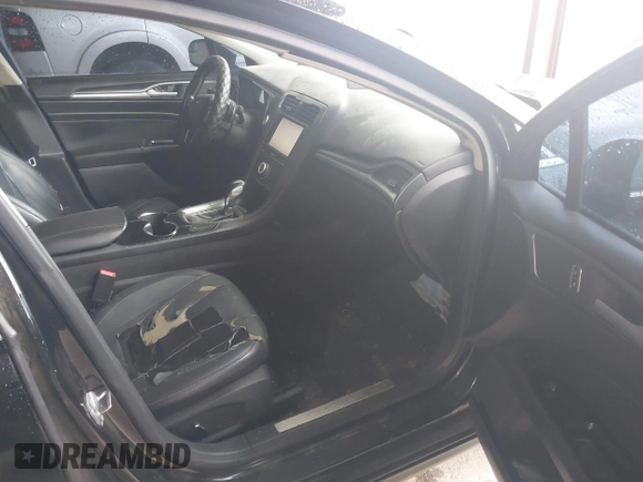 2014 Ford Fusion Titanium with VIN 3FA6P0K99ER235785, listed as a IAAI auction lot 41946638 with 212,939 mi miles and . Bid and sale history available at DreamBid. Image 5.