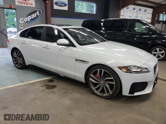 2016 Jaguar XF S with VIN SAJBG4BV0GCY00411, listed as a Copart auction lot 66068964 with 94,983 mi miles and Salvage Title. Bid and sale history available at carsss.com. Image 4.
