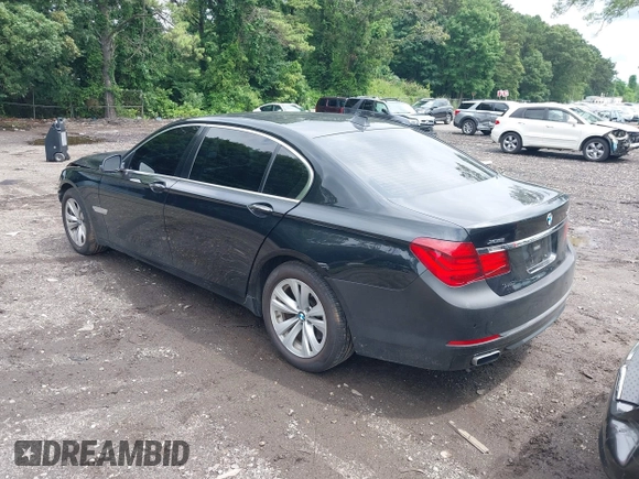 2015 BMW 7 Series 740Li xDrive with VIN WBAYF4C55FG291723, listed as a IAAI auction lot 42694382 with 101,140 mi miles and . Bid and sale history available at DreamBid. Image 3.