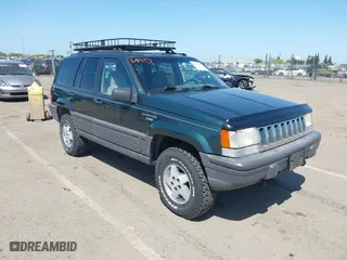 1995 Jeep Grand Cherokee Laredo with VIN 1J4GZ58Y2SC669152, listed as a IAAI auction lot 42077067 with 134,022 mi miles. Bid and sale history available at carsss.com. Image 1.