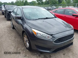 2016 Ford Focus SE z VIN 1FADP3F29GL292091, wystawiony jako IAAI lot #42688797 z przebiegiem 114 725 mil mil oraz . Historia ofert i sprzedaży dostępna na DreamBid. Obrazek 1.
