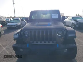 2023 Jeep Wrangler Rubicon with VIN 1C4JJXR67PW662277, listed as a IAAI auction lot 41950065 with 35,714 mi miles and . Bid and sale history available at DreamBid. Image 12.