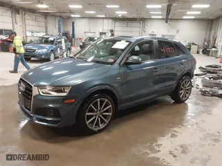 2018 Audi Q3 Premium with VIN WA1ECCFS4JR027295, listed as a IAAI auction lot 41719073 with 74,656 mi miles. Bid and sale history available at carsss.com. Image 18.