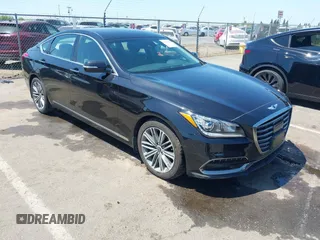 2018 Genesis G80 3.8L z VIN KMHGN4JE3JU284909, wystawiony jako IAAI lot #42188611 z przebiegiem 37 215 mil mil oraz . Historia ofert i sprzedaży dostępna na DreamBid. Obrazek 1.
