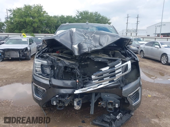 2018 Ford Expedition Max Limited z VIN 1FMJK2ATXJEA70785, wystawiony jako IAAI lot #42099109 z przebiegiem 118 144 mil mil oraz . Historia ofert i sprzedaży dostępna na DreamBid. Obrazek 13.