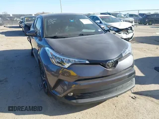 2019 Toyota C-HR XLE with VIN JTNKHMBX1K1062180, listed as a IAAI auction lot 41769979 with 75,159 mi miles. Bid and sale history available at carsss.com. Image 1.