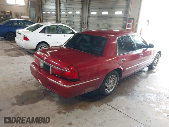2001 Mercury Grand Marquis GS z VIN 2MEFM74W01X636957, wystawiony jako IAAI lot #42270858 z przebiegiem 181 372 mil mil oraz . Historia ofert i sprzedaży dostępna na DreamBid. Obrazek 4.