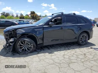 2025 Mazda CX-70 Premium Plus с VIN JM3KJEHA3S1113266, выставлен на аукционе Copart как лот 56539755 с пробегом 6 543 миль миль и Списание • Salvage title. История ставок и продаж доступна на DreamBid. Изображение 1.