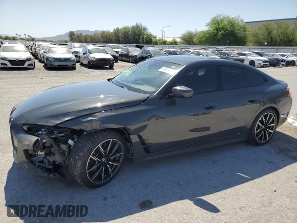 2023 BMW i4 eDrive40 with VIN WBY73AW0XPFR26365, listed as a Copart auction lot 56900944 with 15,017 mi miles and Salvage Title. Bid and sale history available at carsss.com. Image 1.