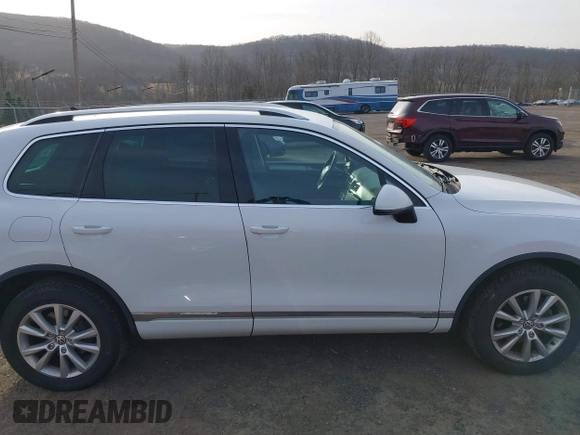 2013 Volkswagen Touareg Exec с VIN WVGEF9BP0DD006992, выставлен на аукционе IAAI как лот 41800140 с пробегом 177 299 миль миль и . История ставок и продаж доступна на DreamBid. Изображение 13.