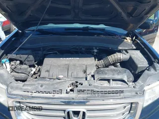 2013 Honda Ridgeline RTL with VIN 5FPYK1F57DB005538, listed as a IAAI auction lot 41985586 with 152,697 mi miles and . Bid and sale history available at DreamBid. Image 10.