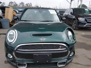 2019 MINI Convertible Cooper S z VIN WMWWG9C5XK3E40620, wystawiony jako IAAI lot #42379122 z przebiegiem 5 496 mil mil oraz . Historia ofert i sprzedaży dostępna na DreamBid. Obrazek 12.