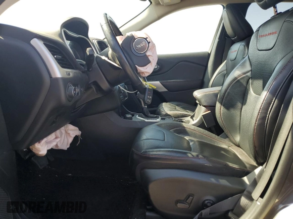 2017 Jeep Cherokee Trailhawk L Plus with VIN 1C4PJMBS4HD237094, listed as a Copart auction lot 61051675 with 104,852 mi miles and Salvage title. Bid and sale history available at DreamBid. Image 7.