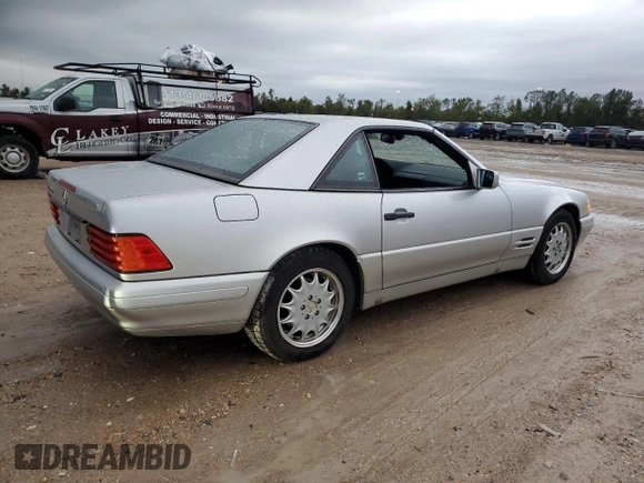 1997 Mercedes-Benz SL 500 with VIN WDBFA63F4VF148651, listed as a Copart auction lot 75893884 with 96,697 mi miles and Clean title. Bid and sale history available at DreamBid. Image 3.