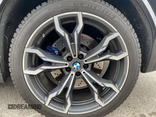 2021 BMW X3 M with VIN 5YMTS0C05M9G46973, listed as a IAAI auction lot 41334083 with 42,819 mi miles. Bid and sale history available at carsss.com. Image 16.
