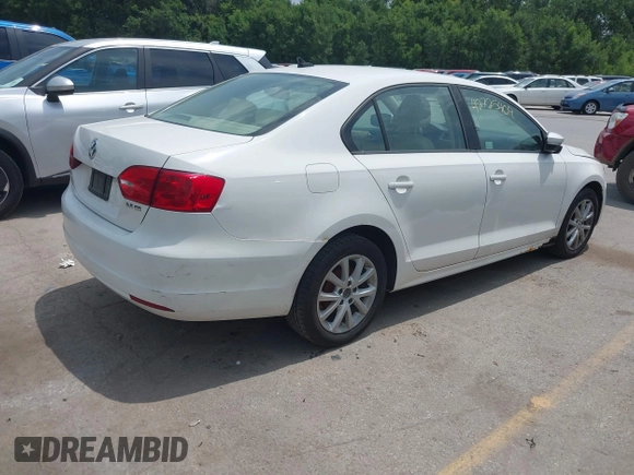 2011 Volkswagen Jetta SE with VIN 3VWDX7AJXBM348012, listed as a IAAI auction lot 42725404 with 235,361 mi miles and . Bid and sale history available at DreamBid. Image 4.