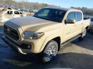 2017 Toyota Tacoma SR5 with VIN 3TMCZ5ANXHM088347, listed as a IAAI auction lot 41591318 with 103,800 mi miles and . Bid and sale history available at DreamBid. Image 2.