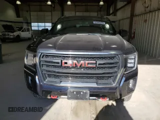 2021 GMC Yukon AT4 with VIN 1GKS2CKD7MR418968, listed as a Copart auction lot 82445284 with 73,660 mi miles and Salvage Title. Bid and sale history available at carsss.com. Image 5.