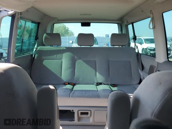 2000 Volkswagen EuroVan с VIN WV2MH4703YH013265, выставлен на аукционе Copart как лот 59003645 с пробегом Не указан миль и Списание • Salvage title. История ставок и продаж доступна на DreamBid. Изображение 10.